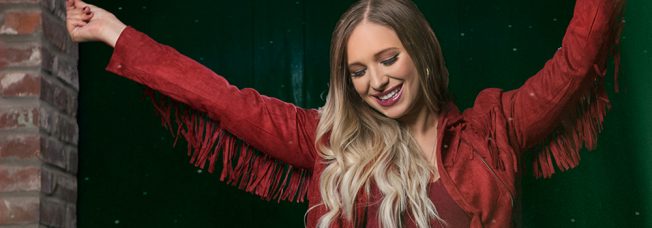 Exclusive: Olivia Lane Premieres “Rockin’ Around The Christmas Tree” New Video